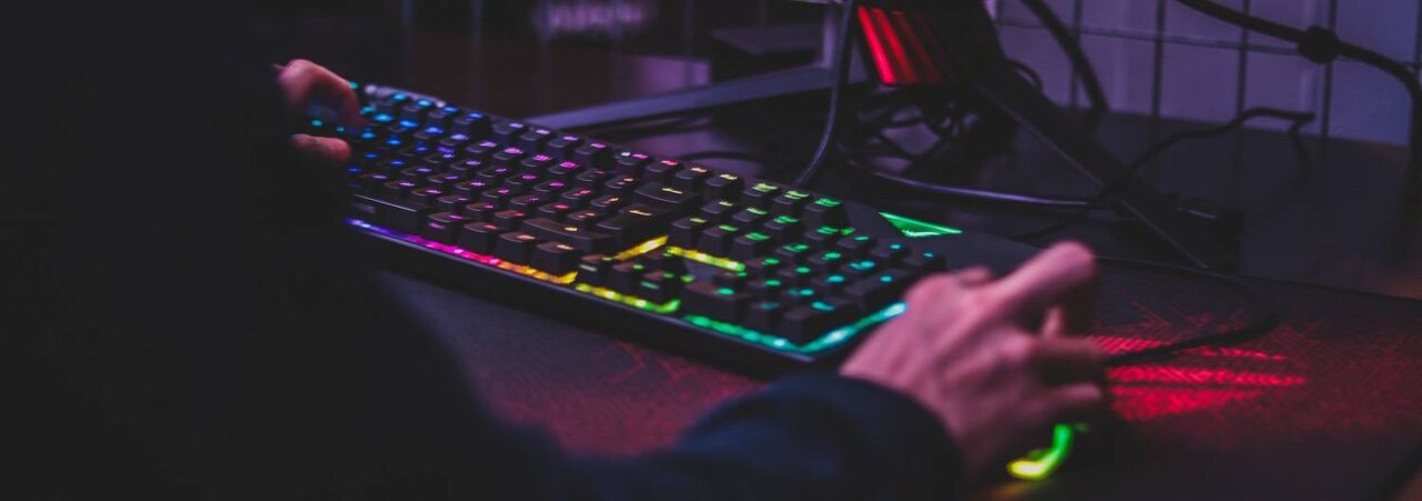 Guy gaming on a PC